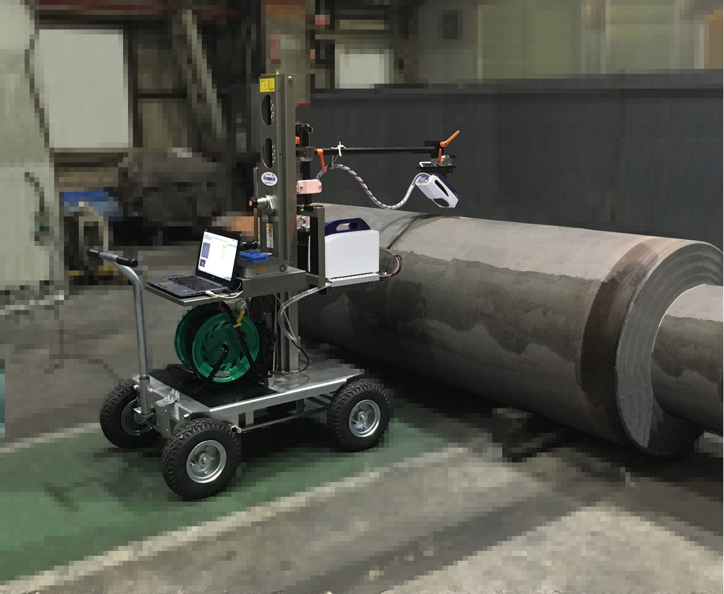 Pulstec's XRD analyzer performing field measurements of a large metal tube